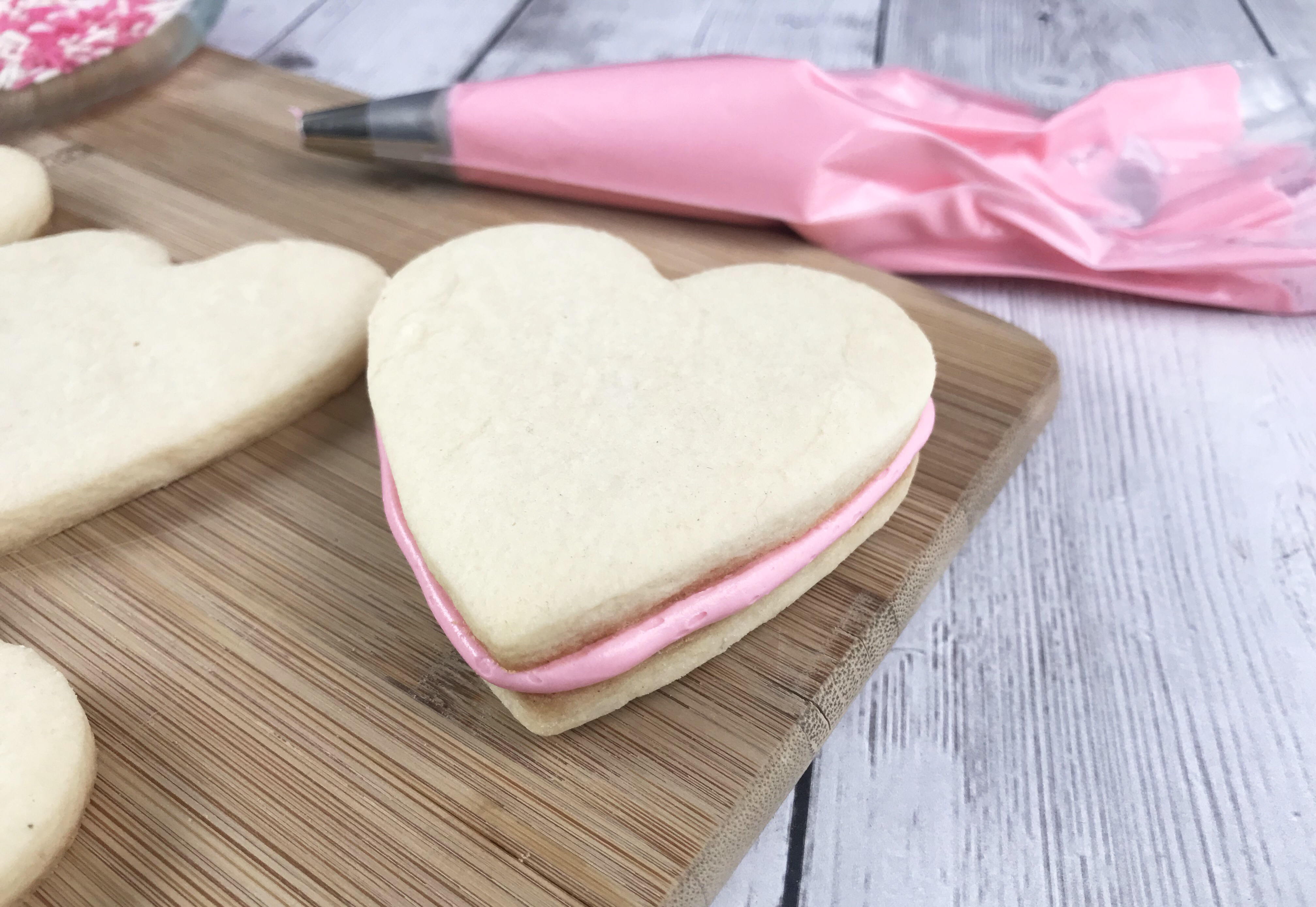Assembling Valentines Day Sandwich Cookies