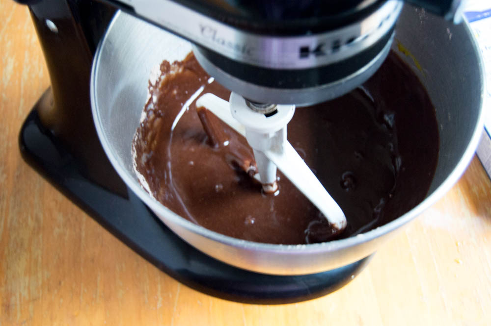 Mixed brownie mix in a stand mixer